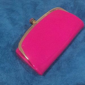 Hot pink patent clutch